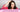Woman noticing post-menopausal hair loss and hair thinning after menopause